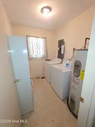 2902 Roanoke Avenue, New Bern, NC 28562 — 3-bedroom home in Colony Estates, New Bern, NC, photo 9 of 21: Laundry Room