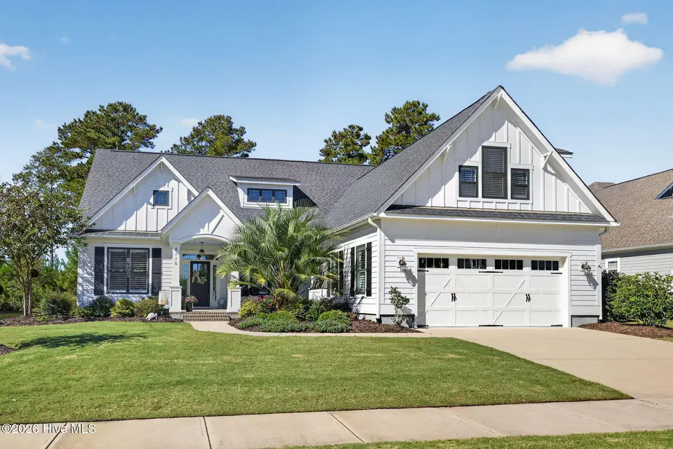 8110 Manassas Lake Lane, Leland, NC 28451 — 3-bedroom home in Brunswick Forest, Leland, NC, photo 1 of 69: Front Exterior
