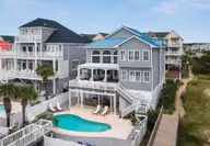 349 W First Street, Ocean Isle Beach, NC 28469 — 6-bedroom waterfront home in Islander Resort, Ocean Isle Beach, NC, photo 4 of 74: Screen Shot 2025-04-01 at 2.40.06 PM