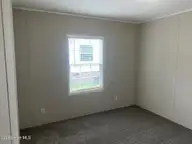 110 S 1st Street, Princeville, NC 27886 — 4-bedroom manufactured home, Princeville, NC, photo 14 of 26: Bedroom 2 view 1