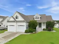 112 White Heron Lane, Swansboro, NC 28584 — 3-bedroom waterfront home in Bluewater Cove, Swansboro, NC, photo 1 of 60: Front 1