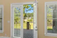 9274 Oldfield Road NW, Calabash, NC 28467 — 4-bedroom waterfront home in Crow Creek, Calabash, NC, photo 12 of 77: Back Door