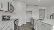 707 Lazy Elm Lane, Aberdeen, NC 28315 — 5-bedroom home in Collinswood, Aberdeen, NC, photo 7 of 38: Kitchen