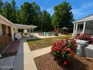 184 Timber Cove Drive, Whiteville, NC 28472 — 4-bedroom home in Timber Cove, Whiteville, NC, photo 9 of 34: Backyard 42126