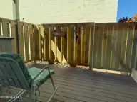 283 Salter Path Road 115, Pine Knoll Shores, NC 28512 — 2-bedroom waterfront condo in Pine Knoll Townes, Pine Knoll Shores, NC, photo 6 of 15: Patio