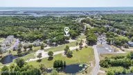 213 Kings Trail # 1004, Sunset Beach, NC 28468 — 2-bedroom condo in Sea Trail Plantation, Sunset Beach, NC, photo 5 of 52: 40_drone