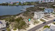 701 New River Inlet Road, North Topsail Beach, NC 28460 — 5-bedroom waterfront home in Sea Dunes Village, North Topsail Beach, NC, photo 11 of 29: DJI_20260325134751_0077_D