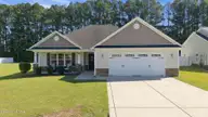 2831 Oakwood Drive, Winterville, NC 28590 — 3-bedroom home in Mellon Downs, Winterville, NC, photo 1 of 52: Front of Home