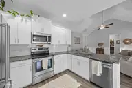 2120 Blue Bonnet Circle, Castle Hayne, NC 28429 — 3-bedroom home in Rachel's Place, Castle Hayne, NC, photo 6 of 30: Kitchen View 2