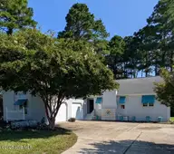 6105 Pelican Drive, New Bern, NC 28560 — 3-bedroom home in Fairfield Harbour, New Bern, NC, photo 1 of 42