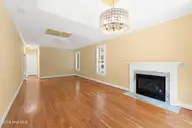 573 Coral Ridge Road, Pine Knoll Shores, NC 28512 — 4-bedroom waterfront home in Beacon's Reach, Pine Knoll Shores, NC, photo 24 of 59: Primary suite