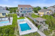 6715 Ocean Drive, Emerald Isle, NC 28594 — 6-bedroom waterfront home in Shell Cove, Emerald Isle, NC, photo 1 of 66: Back Exterior