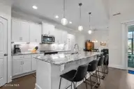 2267 Reefside Loop NE, Leland, NC 28451 — 3-bedroom home in Compass Pointe, Leland, NC, photo 14 of 71: kitchen