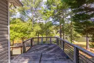142 Overlook Drive, West End, NC 27376 — 3-bedroom waterfront home in Seven Lakes North, West End, NC, photo 23 of 30: back deck