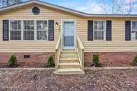 371 Harley Drive, Willard, NC 28478 — 3-bedroom manufactured home in Drake Acres, Willard, NC, photo 3 of 46: 9_front entryway