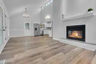 1223 Pelican Drive, New Bern, NC 28560 — 3-bedroom waterfront home in Fairfield Harbour, New Bern, NC, photo 3 of 38: Living Room into Dining area & kitchen