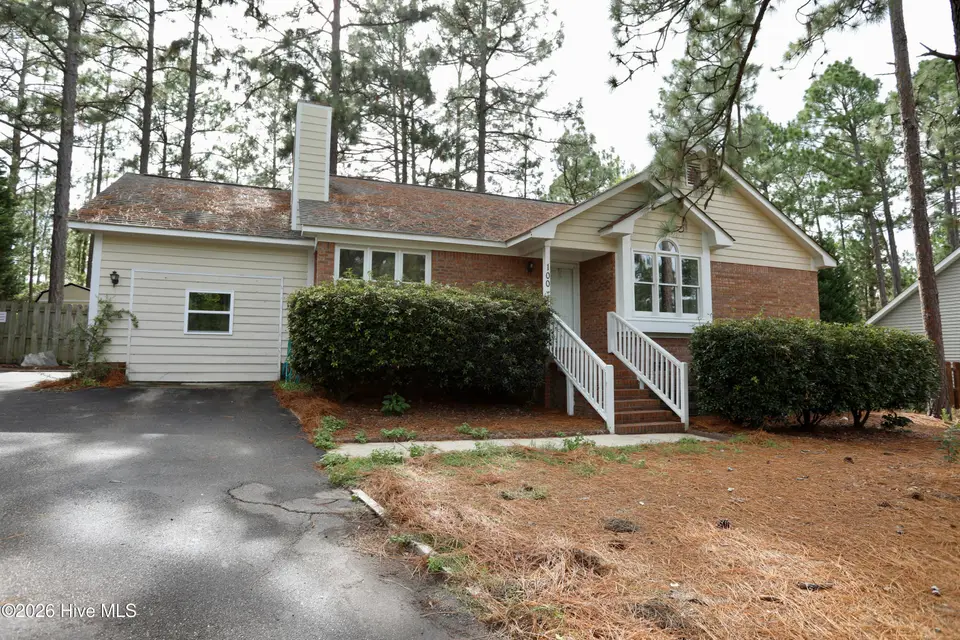 100 Sawmill Road E, Pinehurst, NC 28374 — 3-bedroom home in Village Acres, Pinehurst, NC, photo 1 of 25