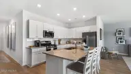 1027 Harbor Drive Lot 36, Calabash, NC 28467 — 3-bedroom home in Hunter's Trace, Calabash, NC, photo 2 of 15: crs_1547_pic_dover_kitchen_2of4