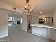 10 Pine Tree Road # 125, Pinehurst, NC 28374 — 3-bedroom condo in St Andrews Cond, Pinehurst, NC, photo 7 of 19: Dining to Living