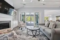 6476 Bryson Drive SW, Ocean Isle Beach, NC 28469 — 4-bedroom home in Retreat At OIB, Ocean Isle Beach, NC, photo 10 of 55: Double sliders to Carolina room