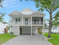 112 NE 27th Street, Oak Island, NC 28465 — 3-bedroom home, Oak Island, NC, photo 1 of 68