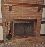 2803 Hope Drive NW, Wilson, NC 27896 — 3-bedroom home in Stoneybrook Farm, Wilson, NC, photo 6 of 28: 2803 Hope fireplace1-1
