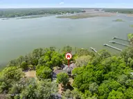 524 Admirals Court SE, Bolivia, NC 28422 — 3-bedroom waterfront home in River Run Plantation, Bolivia, NC, photo 1 of 76: 524AdmiralsCtAerials-261
