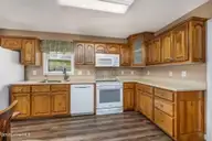 514 Woods Court SW, Sunset Beach, NC 28468 — 3-bedroom home in Sea Trail Plantation, Sunset Beach, NC, photo 19 of 50: 54-web-or-mls-45 kitchen