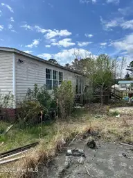 611 Maynard Boulevard, Jacksonville, NC 28546 — 3-bedroom manufactured home in Maynard Manor, Jacksonville, NC, photo 2 of 14: IMG_7614