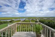 502 N Shore Drive W, Sunset Beach, NC 28468 — 3-bedroom waterfront home in Sunset Beach, Sunset Beach, NC, photo 2 of 50: 30-20250805-200_a7405920_skyvue