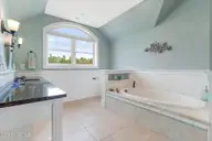 255 Gatsey Lane, Beaufort, NC 28516 — 3-bedroom waterfront home in Stanton Landing, Beaufort, NC, photo 19 of 53: Primary suite top floor