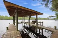 268 Shoreline Drive, New Bern, NC 28562 — 4-bedroom waterfront home in River Bend, New Bern, NC, photo 4 of 69: Private boat lift and dock