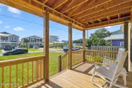 1616 Bonito Lane, Carolina Beach, NC 28428 — 2-bedroom manufactured home in Wilmington Beach, Carolina Beach, NC, photo 5 of 32: View from front porch