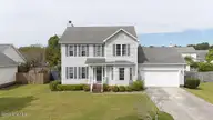 106 Sidney Lane, Jacksonville, NC 28540 — 4-bedroom home in Williamsburg Plantation, Jacksonville, NC, photo 3 of 55: DJI_20261008130019_0001_D