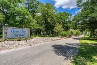 514 Woods Court SW, Sunset Beach, NC 28468 — 3-bedroom home in Sea Trail Plantation, Sunset Beach, NC, photo 5 of 50: 2-web-or-mls-2 entrance