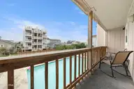 505 N Carolina Beach Avenue Unit 1c, Carolina Beach, NC 28428 — 2-bedroom waterfront condo in Winds at Carolina Beach, Carolina Beach, NC, photo 4 of 44: Balcony 2