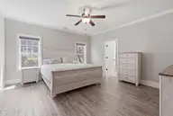 5732 Brown Pelican Lane, Wilmington, NC 28409 — 4-bedroom home in Kaylies Cove, Wilmington, NC, photo 19 of 38: 18_primary bedroom