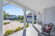 3334 Oyster Tabby Drive, Wilmington, NC 28412 — 4-bedroom waterfront home in Riverlights, Wilmington, NC, photo 16 of 68: 6_front porch