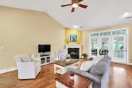 1205 Grandiflora Drive, Leland, NC 28451 — 4-bedroom home in Magnolia Greens, Leland, NC, photo 11 of 72: Living Room