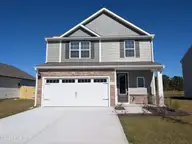 47 S Umbrella Palm Drive, Hampstead, NC 28443 — 4-bedroom home in Southwater Village, Hampstead, NC, photo 1 of 33: 47 Umbrella Palm