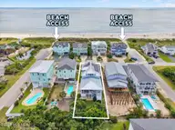 7004 E Beach Drive, Oak Island, NC 28465 — 4-bedroom waterfront home in Paradise Shores, Oak Island, NC, photo 3 of 71: 007-www