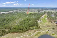 556 Harris Trail SW, Ocean Isle Beach, NC 28469 — lot, Ocean Isle Beach, NC, photo 2 of 5: 93+ Acres