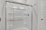 6795 Fellowship Drive, Leland, NC 28451 — 3-bedroom townhome in Grand Park, Leland, NC, photo 15 of 47: Primary walk-in shower