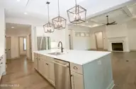 102 Greystones Court, Pinehurst, NC 28374 — 4-bedroom home in National, Pinehurst, NC, photo 17 of 55: Kitchen to living room