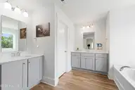 146 Ballantine Grove Lane, Newport, NC 28570 — 4-bedroom home in Ballantine Grove, Newport, NC, photo 19 of 51: Primary ensuite