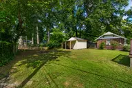 907 Broad Street W, Wilson, NC 27893 — 3-bedroom home, Wilson, NC, photo 22 of 25: Shaded Backyard with Storage & Lean-to