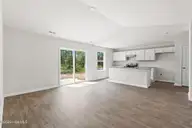 931 Plymouth Road, Boiling Spring Lakes, NC 28461 — 3-bedroom home in The Highlands at Boiling Spring Lakes, Boiling Spring Lakes, NC, photo 6 of 31: Sage Living Area