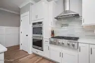 2918 E Beach Drive, Oak Island, NC 28465 — 10-bedroom waterfront home, Oak Island, NC, photo 19 of 74: Tan and No Plan pict84