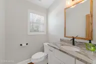 106 Wyndward Court, Emerald Isle, NC 28594 — 4-bedroom home in Wyndtree, Emerald Isle, NC, photo 20 of 63: Second floor half bath