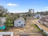 321 NE 59th Street, Oak Island, NC 28465 — 4-bedroom home, Oak Island, NC, photo 8 of 61: 5-web-or-mls-DJI_20260303105350_0825_D